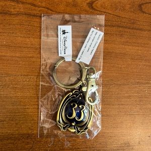 Disney Club 33 Keychain. NIP. Brass w/ Blue Enamel. Pretty filigree.